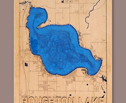Houghton Lake map: laser-engraved streets on birch with the lake cut out and filled with blue epoxy resin, raised HOUGHTON LAKE lettering, in a wood frame
